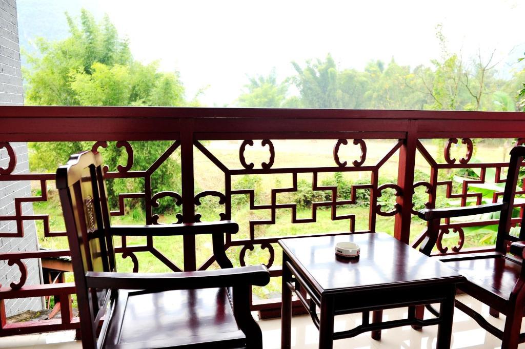 Готель Dragon River Retreat Яншуо Номер фото