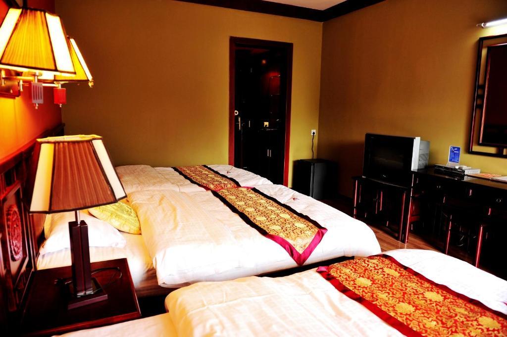 Готель Dragon River Retreat Яншуо Номер фото